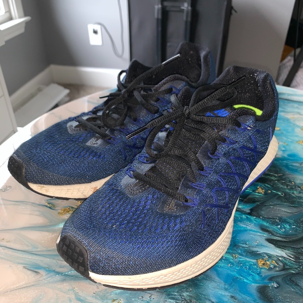 blue NIKE running shoes